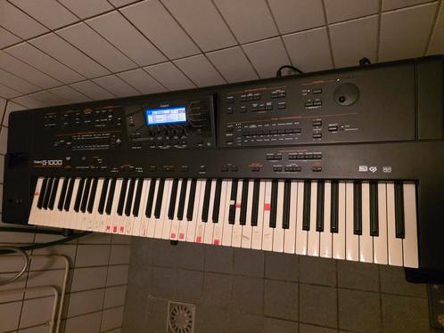 Te koop een mooie   roland  g 1000  keyboard, Muziek en Instrumenten, Keyboards, Gebruikt, 61 toetsen, Roland, Met standaard, Ophalen