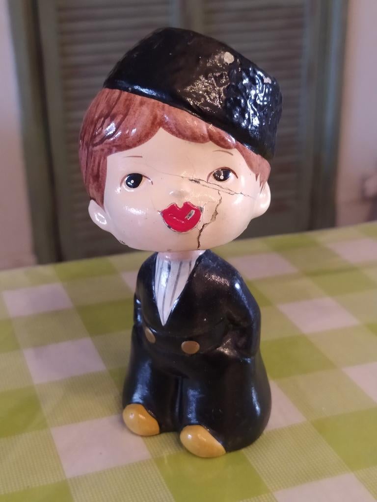 Oud speelgoed mannetje met veer, Ophalen of Verzenden