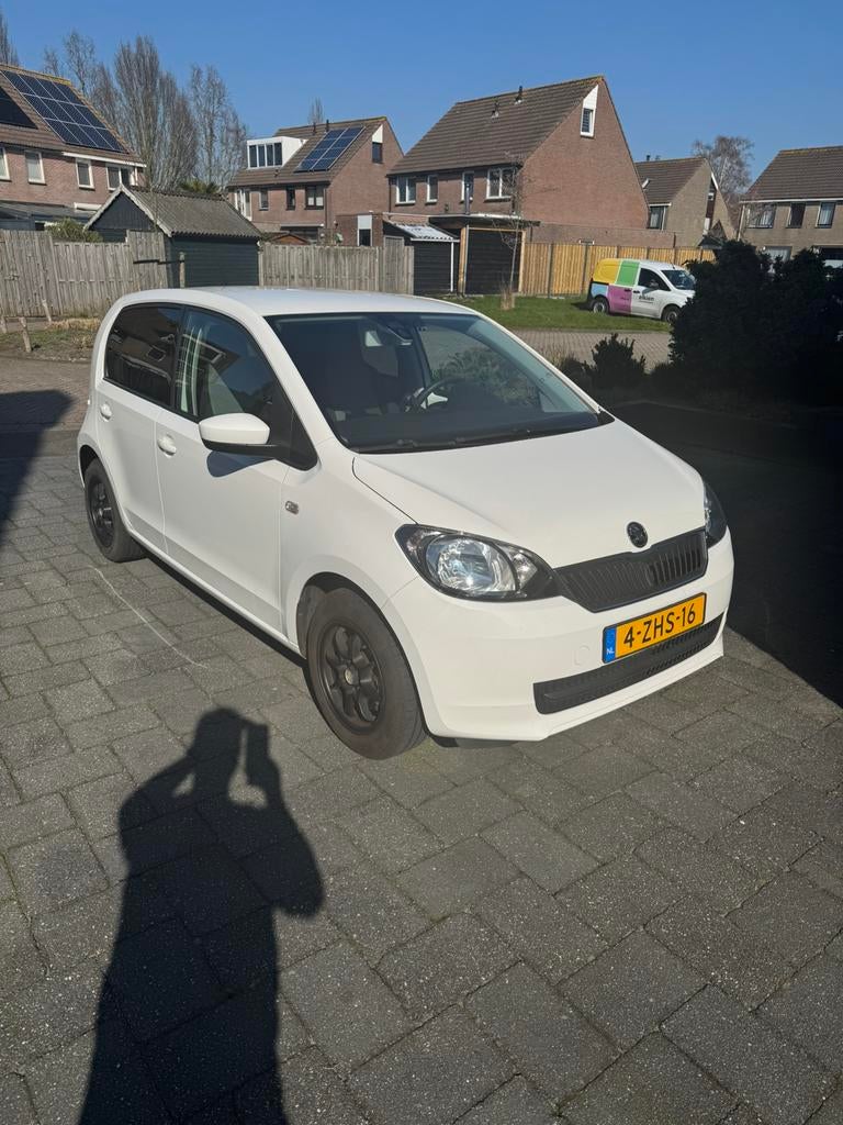 Skoda Citigo 1.0 60pk Greentech 5 deurs 2015 Wit, Voorwielaandrijving, Stof, 840 kg, 4 stoelen