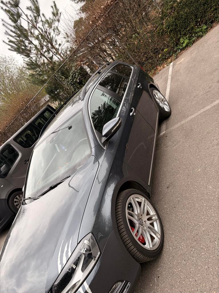 Volkswagen Passat 1.6 TDI 77KW Bluemotion Variant 2012 Grijs, Auto's, Voorwielaandrijving, 4 cilinders, 23 km/l, Origineel Nederlands