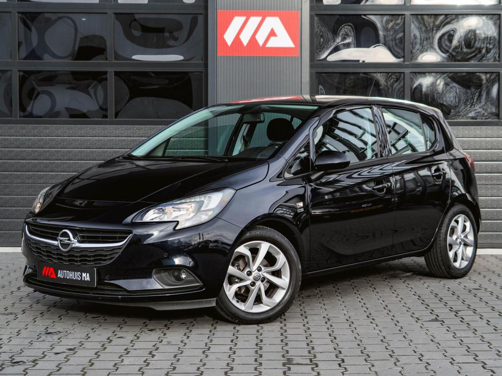 Opel Corsa 1.4 120 Jaar Edition Airco|Camera|Clima|Cruise|LM, Auto's, Voorwielaandrijving, Gebruikt, 4 cilinders, Met garantie (alle)