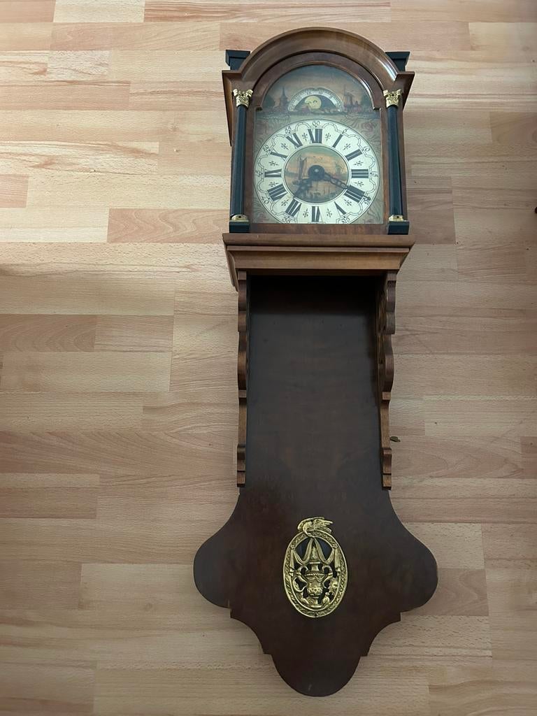 Antieke friese staartklok, Ophalen