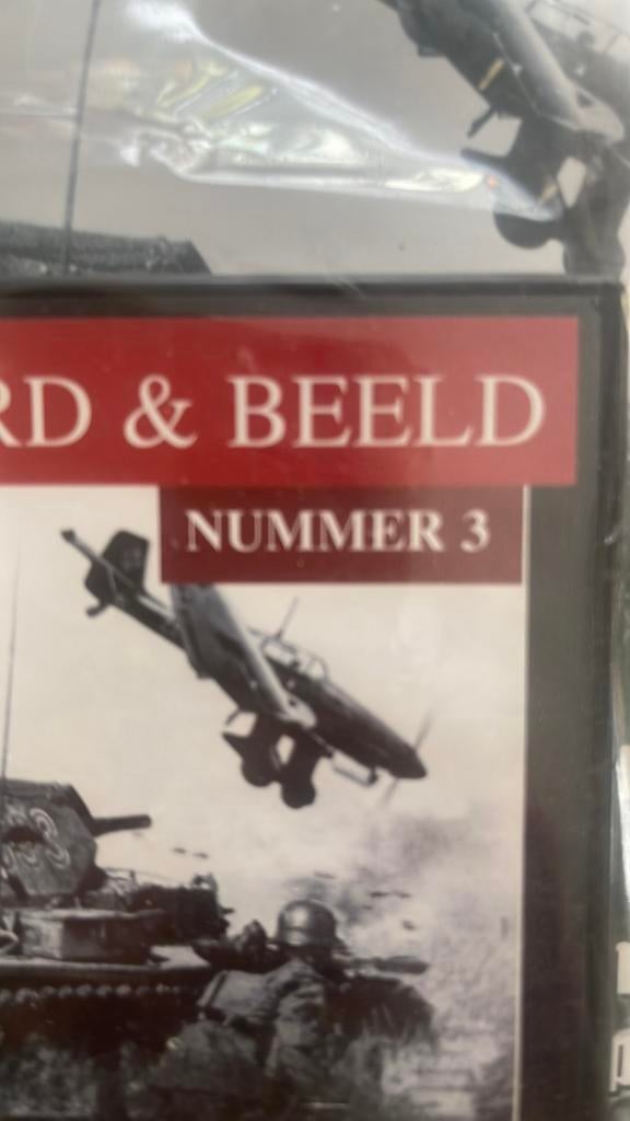 Twaalf dvd plus magazine over oorlogsdocumantaires, Ophalen of Verzenden, Zo goed als nieuw