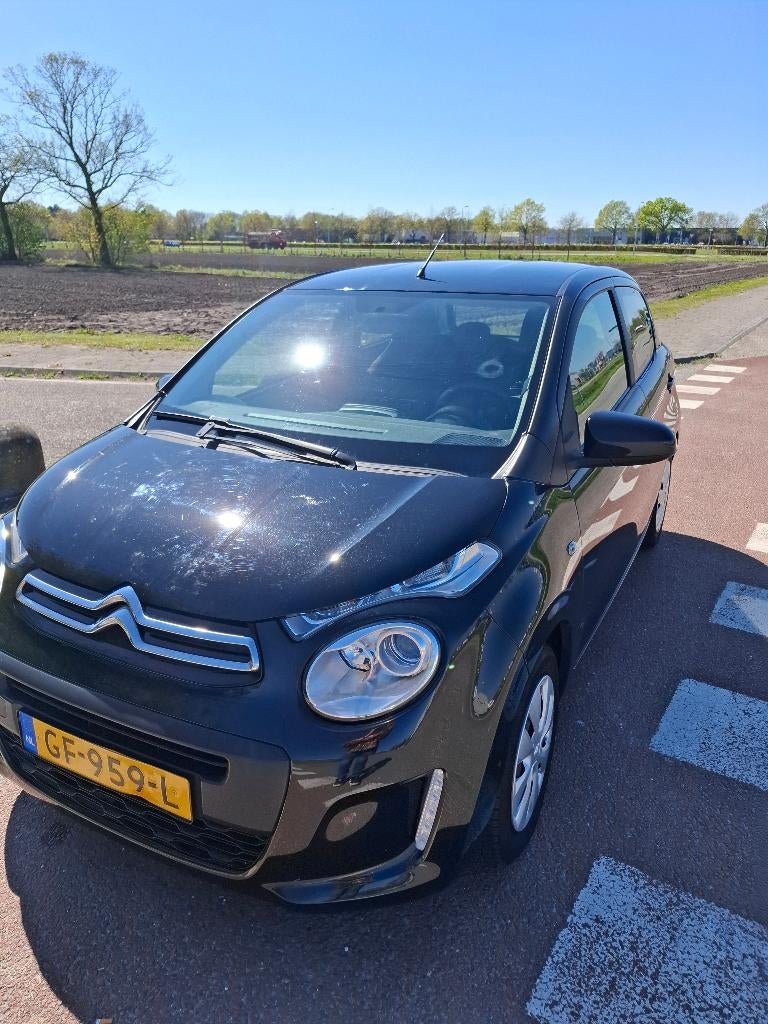 Citroën C1 1.0 E-vti 68 5-DRS 2015 Zwart, Auto's, Voorwielaandrijving, Stof, Start-stop-systeem, Zwart