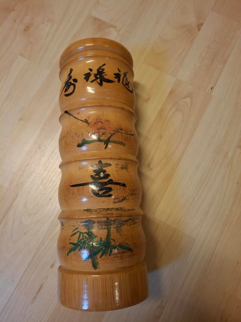 Bamboe vaas met Chinese tekens, Ophalen