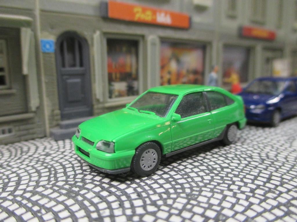 Opel Kadett E Gsi - Herpa appelgroen, Hobby en Vrije tijd, Ophalen of Verzenden, Zo goed als nieuw, Auto, Herpa