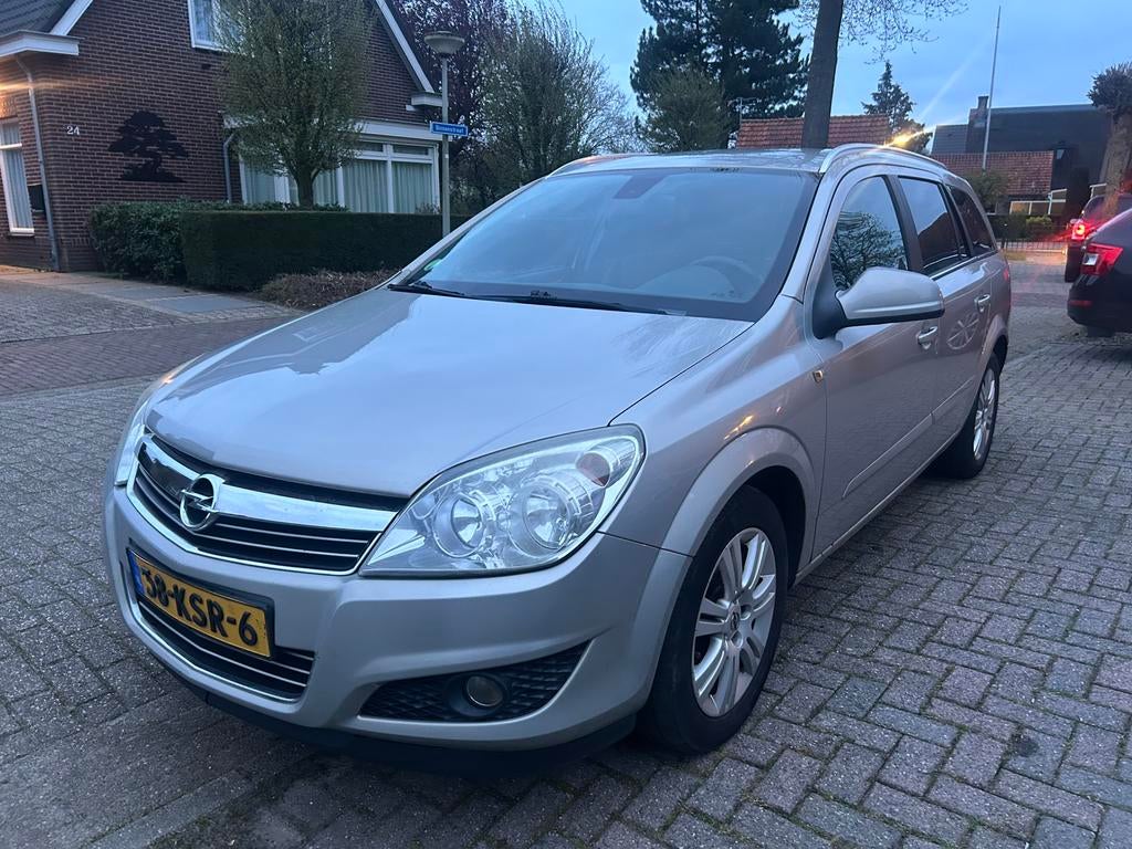 Opel Astra 1.6 16V Station leder navi cruise telefoon airco, Auto's, Opel, Bedrijf, Astra, ABS, Airbags, Airconditioning, Alarm