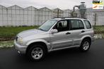 Suzuki Grand Vitara 2.0 S-Limited Automaat 4x4 met Airco, Auto's, Suzuki, Origineel Nederlands, Te koop, Zilver of Grijs, 5 stoelen