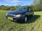 Toyota Starlet 1.3 16V 1998 Blauw, Auto's, Voorwielaandrijving, 74 pk, 4 cilinders, Starlet