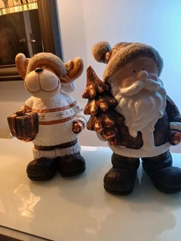 2 winterfiguren , steen, warme winterkleuren  beschikbaar voor biedingen