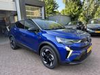 Renault Captur 1.6 E-Tech 145 Techno+Pack Winter! Nieuw!, Stof, Gebruikt, Blauw, Origineel Nederlands