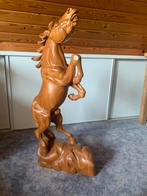 Houten paard, Ophalen