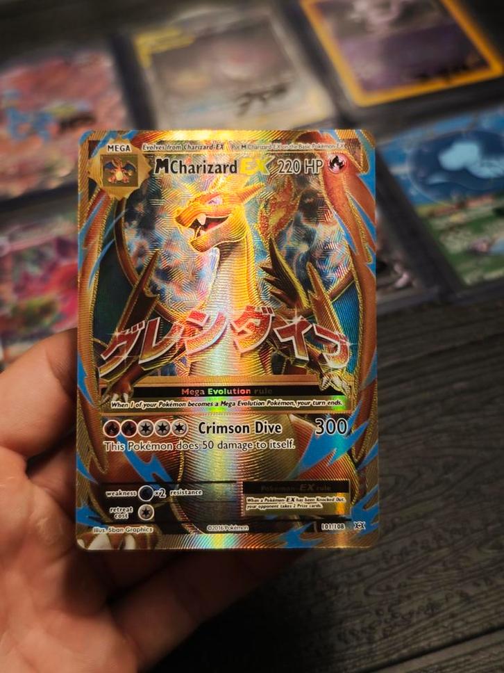 🔥 M Charizard EX 101 Evolutions, Hobby en Vrije tijd, Verzamelkaartspellen | Pokémon, Zo goed als nieuw, Ophalen of Verzenden