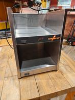 Goed werkende kopjeswarmer, Ophalen