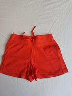 Meisjes 128 korte broek zgan donker oranje, Ophalen of Verzenden, Zo goed als nieuw, Meisje, Broek