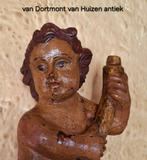 Putto ca1700., Ophalen