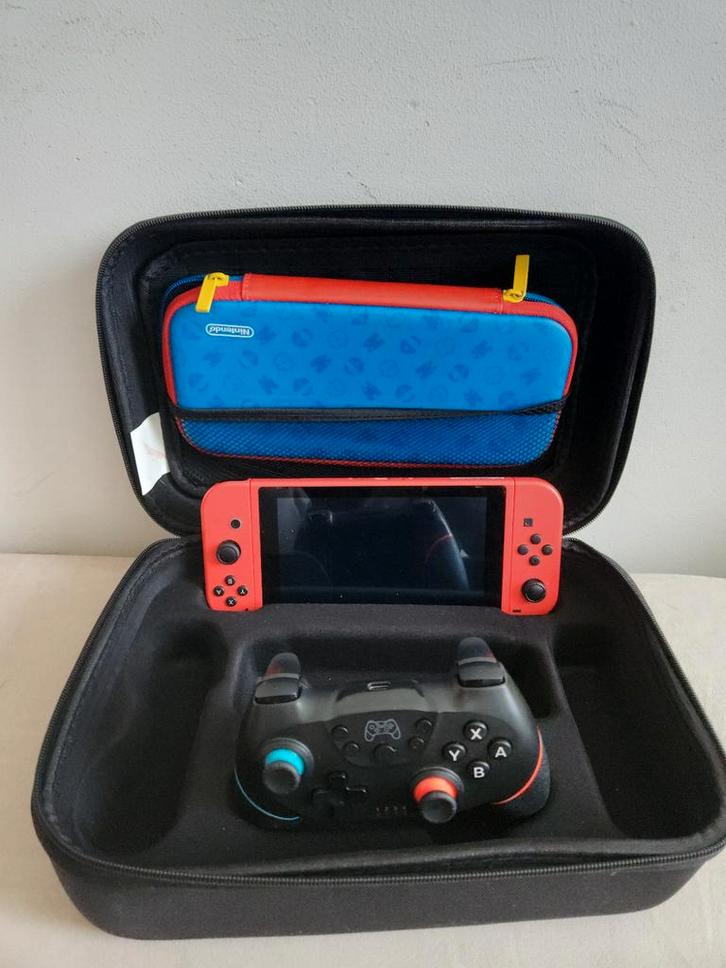 Nintendo swich met 2 games en controler&stuur(zie foto!), Spelcomputers en Games, Spelcomputers | Nintendo Switch, Gebruikt, Switch Original