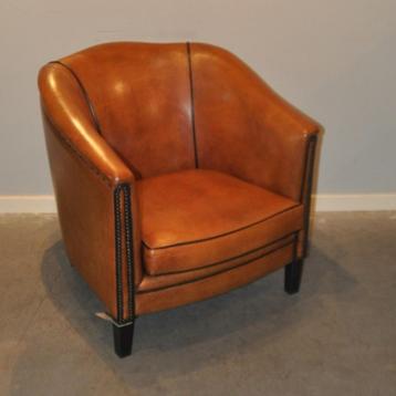 Kleine schapenleren fauteuil in topstaat beschikbaar voor biedingen