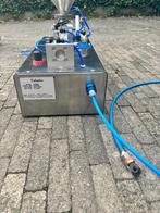 Vulmachine en etiketeermachine, Ophalen