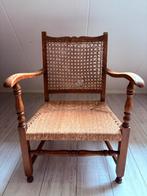 Stoeltje met rieten zitting., Ophalen