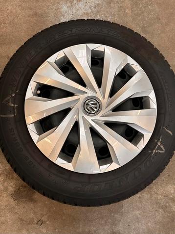 VW Polo Winterset 185/65R15 Dunlop met or.  wieldoppen beschikbaar voor biedingen