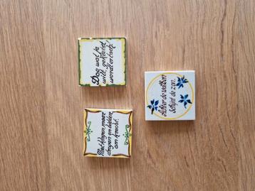 Wandtegeltjes met spreuken beschikbaar voor biedingen