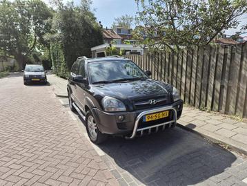 Hyundai Tucson 2.0 leer, clima, cruise, elec ramen beschikbaar voor biedingen
