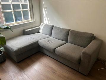GRATIS grijze hoekbank