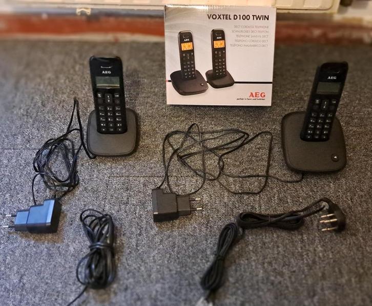 te koop set aeg voxtel d 100 twin telefoons nieuw in doos, Telecommunicatie, Vaste telefoons | Handsets en Draadloos, Nieuw, 2 handsets