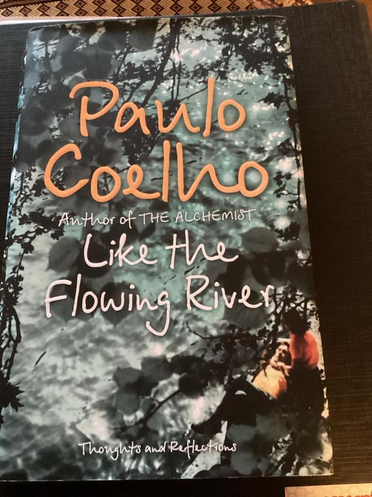 Like The Flowing River - Paulo Coelho, Boeken, Romans, Zo goed als nieuw, Wereld overig, Ophalen of Verzenden