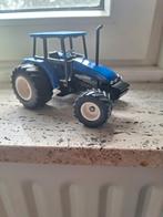 Siku new holland 5635 brede banden, Hobby en Vrije tijd, Modelauto's | 1:32, Ophalen of Verzenden, Zo goed als nieuw, Tractor of Landbouw