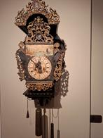 Friese stoelklok, Ophalen