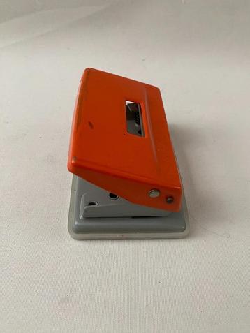 Retro Leuke retro perforator beschikbaar voor biedingen