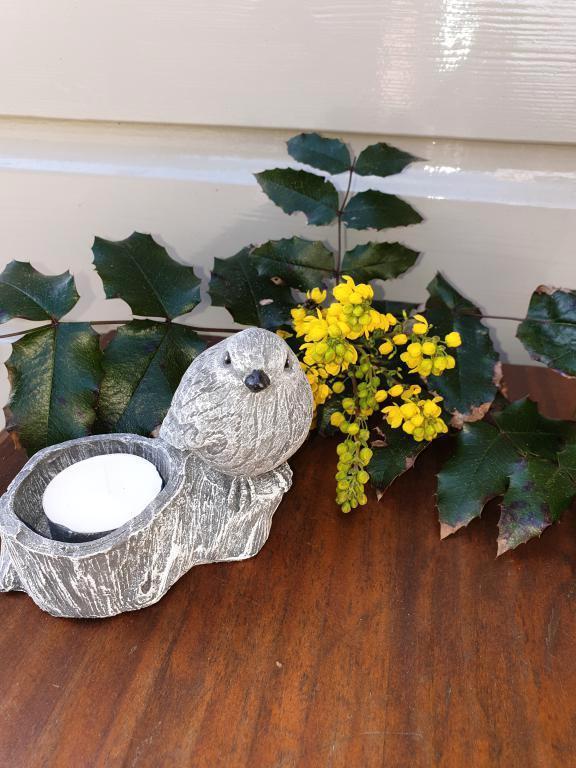 vogel met waxinekaarsje, Huis en Inrichting, Woonaccessoires | Kandelaars en Kaarsen, Nieuw, Minder dan 25 cm, Overige materialen