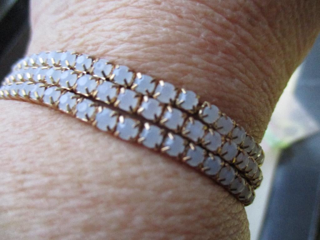 6058/ partij elastische gold plated rhinestone armbanden, Nieuw, Ophalen of Verzenden, Goud, Zilver
