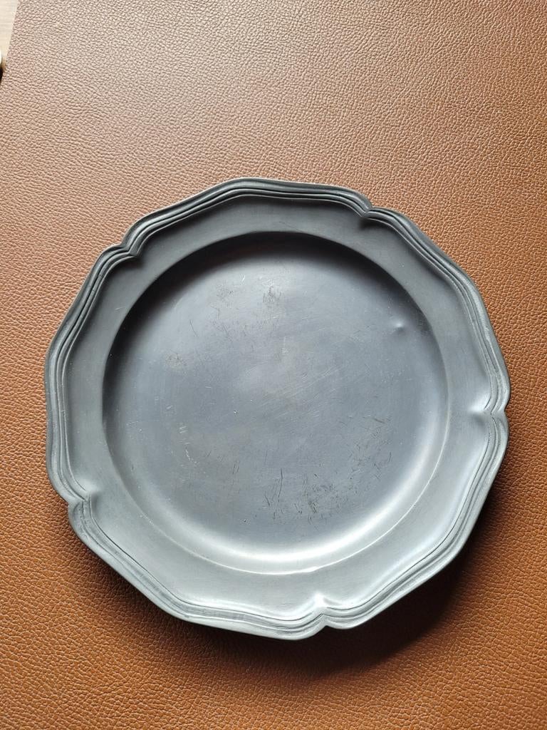 Tinnen bord, Ophalen