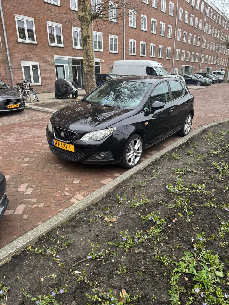 Seat Ibiza 1.4 63KW 5DRS 2009 Zwart, Auto's, Seat, Voorwielaandrijving, Stof, 40 €/maand, 4 cilinders