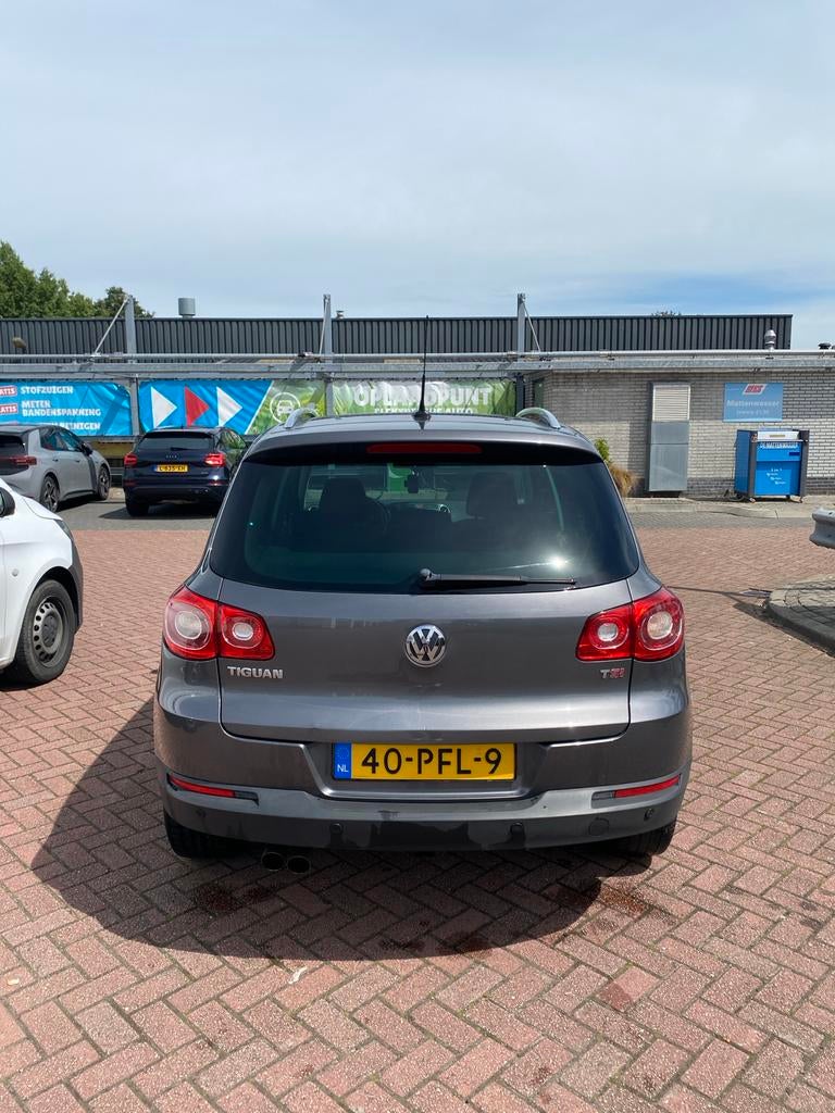 Volkswagen Tiguan 1.4 TSI 110KW 2011 Grijs, Auto's, Volkswagen, Voorwielaandrijving, 15 km/l, 1800 kg, 4 cilinders