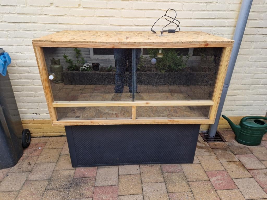 Houten terrarium, Ophalen