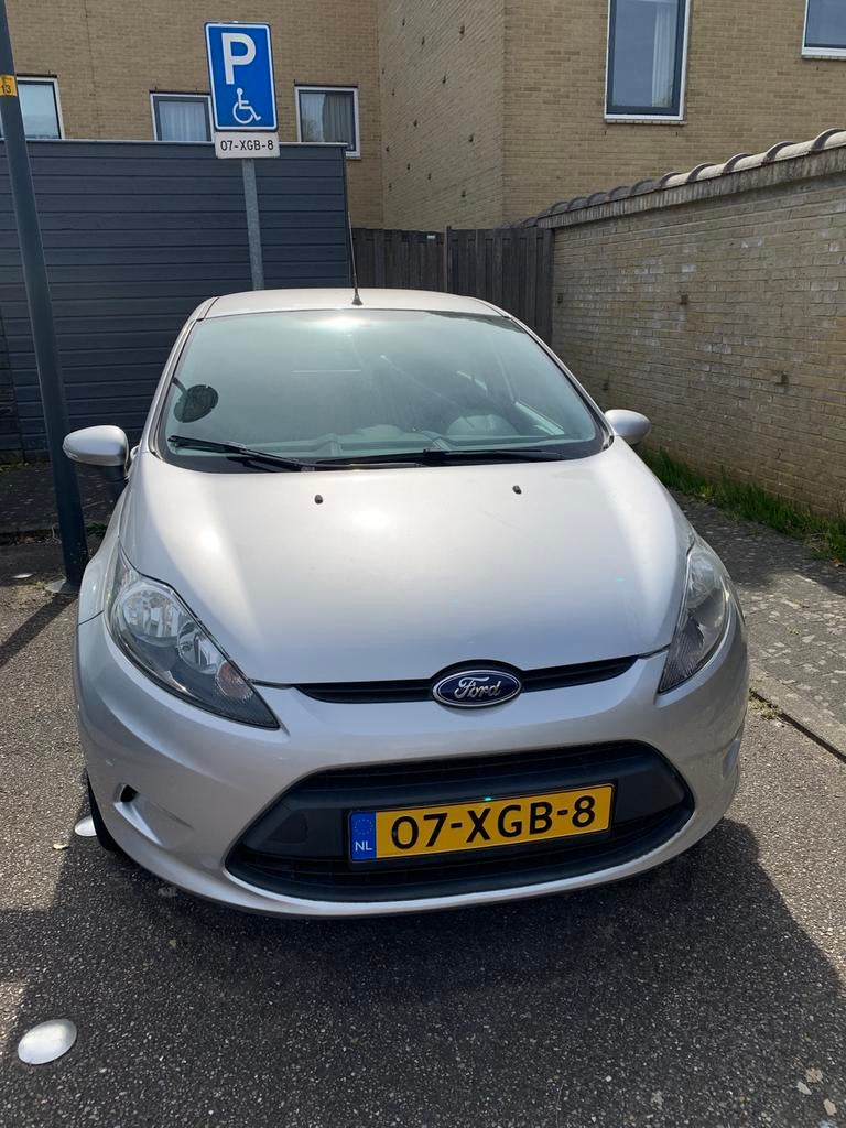 Mooie Ford Fiësta 1.25 44KW 5DR 2012 Grijs met 67.000 km, Auto's, Ford, Voorwielaandrijving, Stof, 40 €/maand, 1242 cc