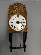 Comtoise klok met wekker, Ophalen