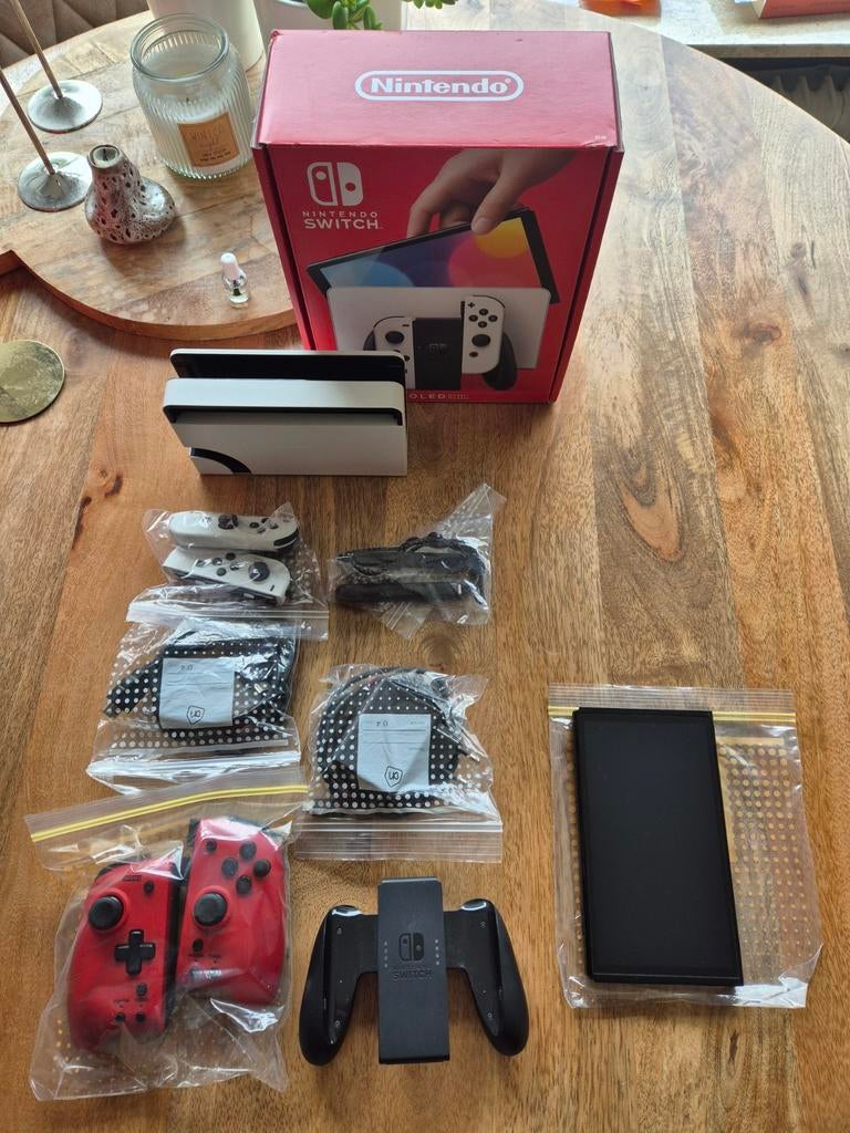 Nintendo Switch OLED met extra controllers, Ophalen, Zo goed als nieuw, Met 2 controllers, Switch OLED