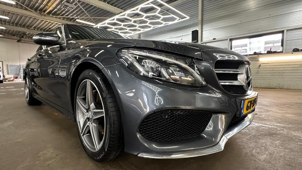 Mercedes-Benz C-Klasse C200 CDI 1.6 100KW 2015 AMG-LINE, Auto's, Mercedes-Benz, 1385 kg, Zwart, 4 cilinders, Leder