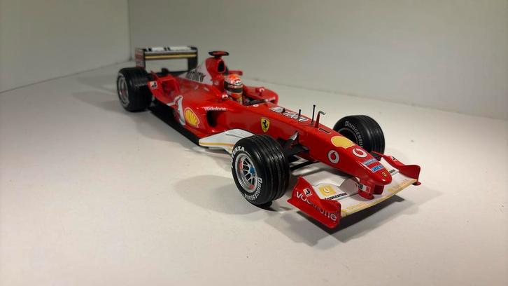 F1 ferrari f2003 - ga m.Schumacher hot wheels 1.18, Hobby en Vrije tijd, Modelauto's | 1:18, Zo goed als nieuw, Hot Wheels, Ophalen of Verzenden