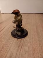 Specht beeldje, Ophalen