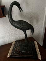 Bronzen vogelbeeld, Ophalen