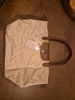 Nieuwe Longchamp schoudertas/schooltas in de kleur creme, ma, Ophalen of Verzenden, Nieuw, Beige, Schoudertasje