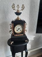 Zwart marmeren pendule, Ophalen