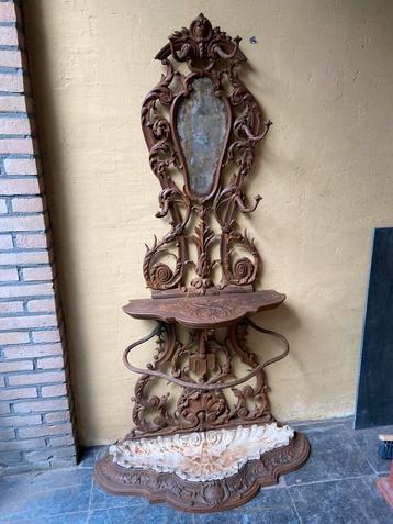 Kapstok ornamentaal gietijzer antiek Corneau Alfred antiek. beschikbaar voor biedingen