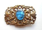 Oude broche met grote blauwe steen. Goudkleurig., Sieraden, Tassen en Uiterlijk, Broches, Ophalen of Verzenden, Zo goed als nieuw